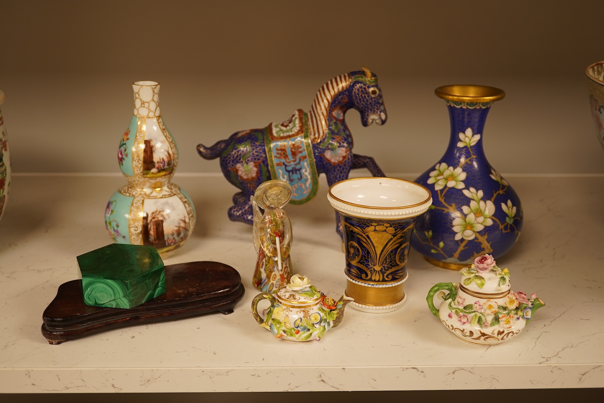 A Chinese cloisonné enamel horse and vase, two miniature Rockingham floral teapots, a malachite box etc (9). Cloisonné horse 20cm long.